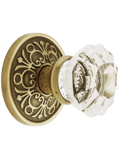 Lancaster Door Set With Fluted Crystal Knobs in Antique Brass.